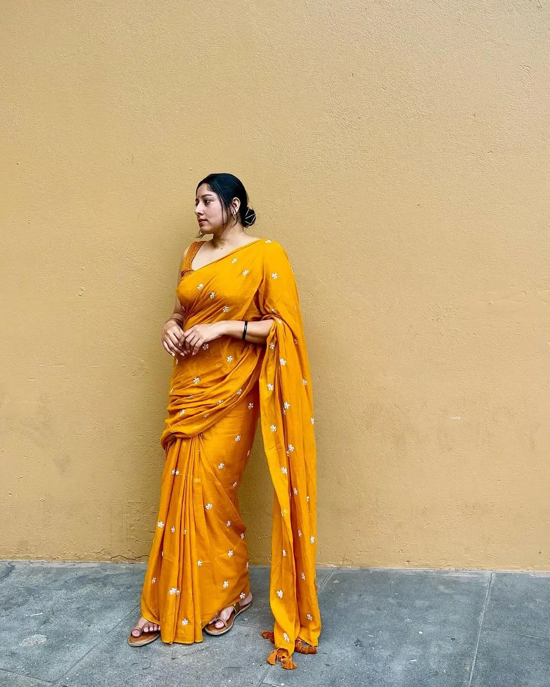 Malayalam Actress Anumol Sleeveless in Yellow Saree